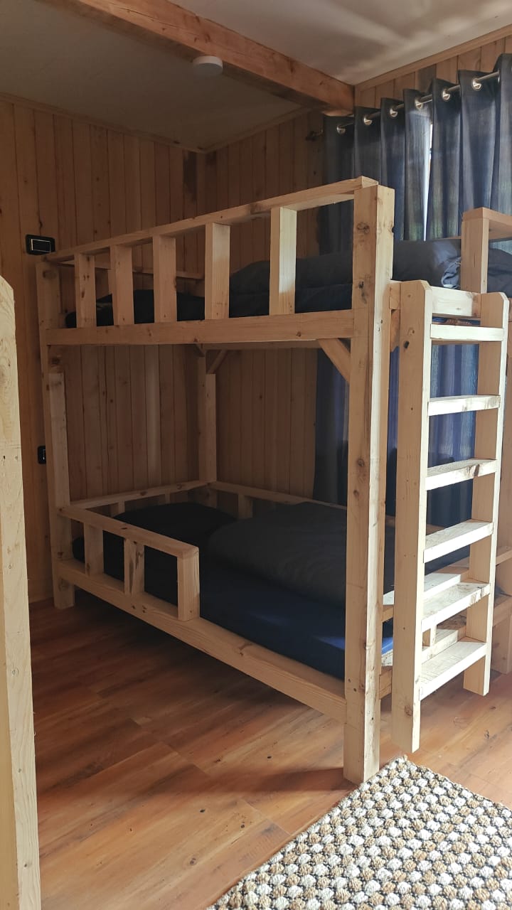Four-bed female dorm at The Library Cafe & Stay