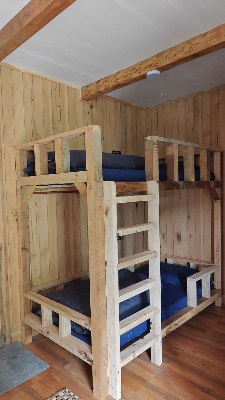 Four-bed female dorm at The Library Cafe & Stay