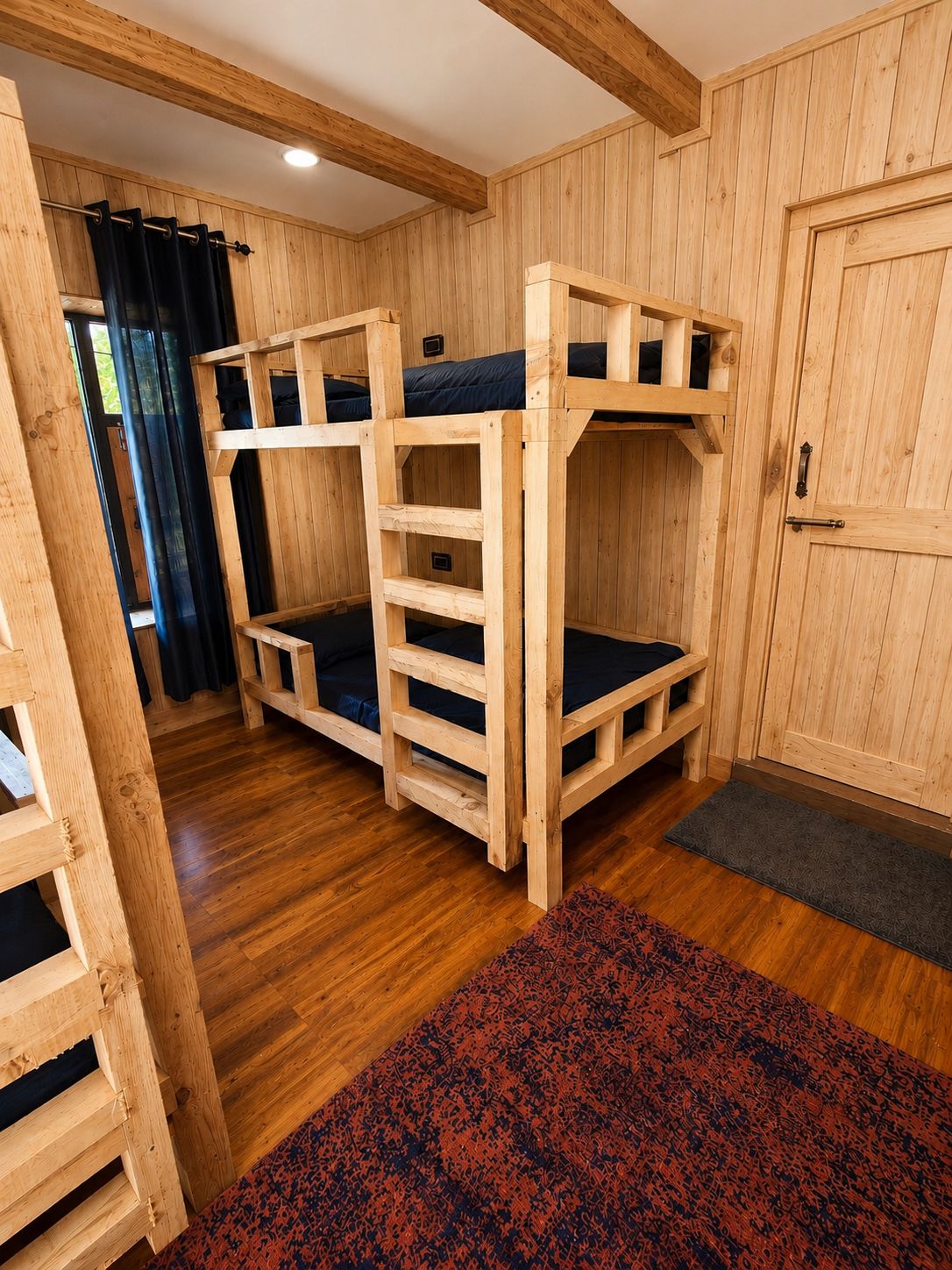 Four-bed mixed dorm at The Library Cafe & Stay